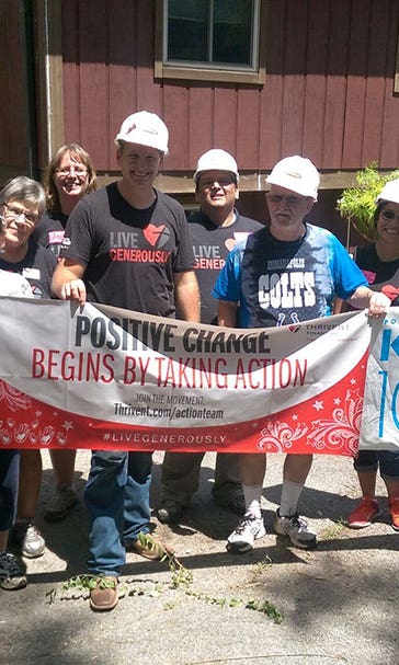 Michael McDowell swings a hammer for Indy Habitat for Humanity